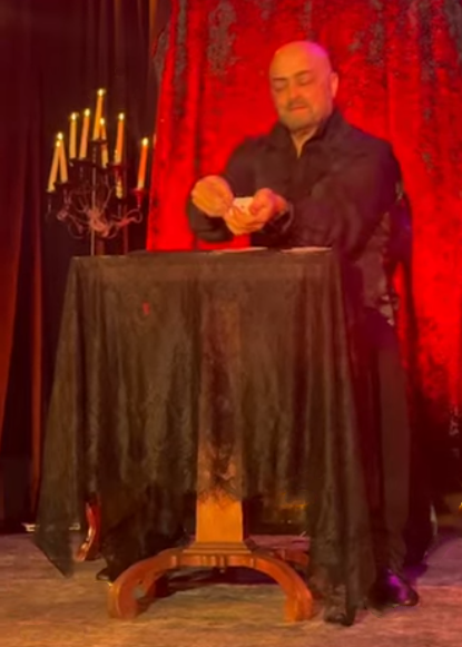 Magician Drew Thomas performs at the Ritz-Carlton Grande Lakes.